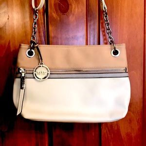 Nicole Miller shoulder bag. Cream tan with grey accent stripe and silver metal.